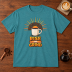 Rise and Grind T-Shirt Heather Galapagos Blue flat lay on walnut coffee bar