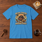 Bean There Drank That T-Shirt Heather Sapphire flat lay on walnut coffee bar