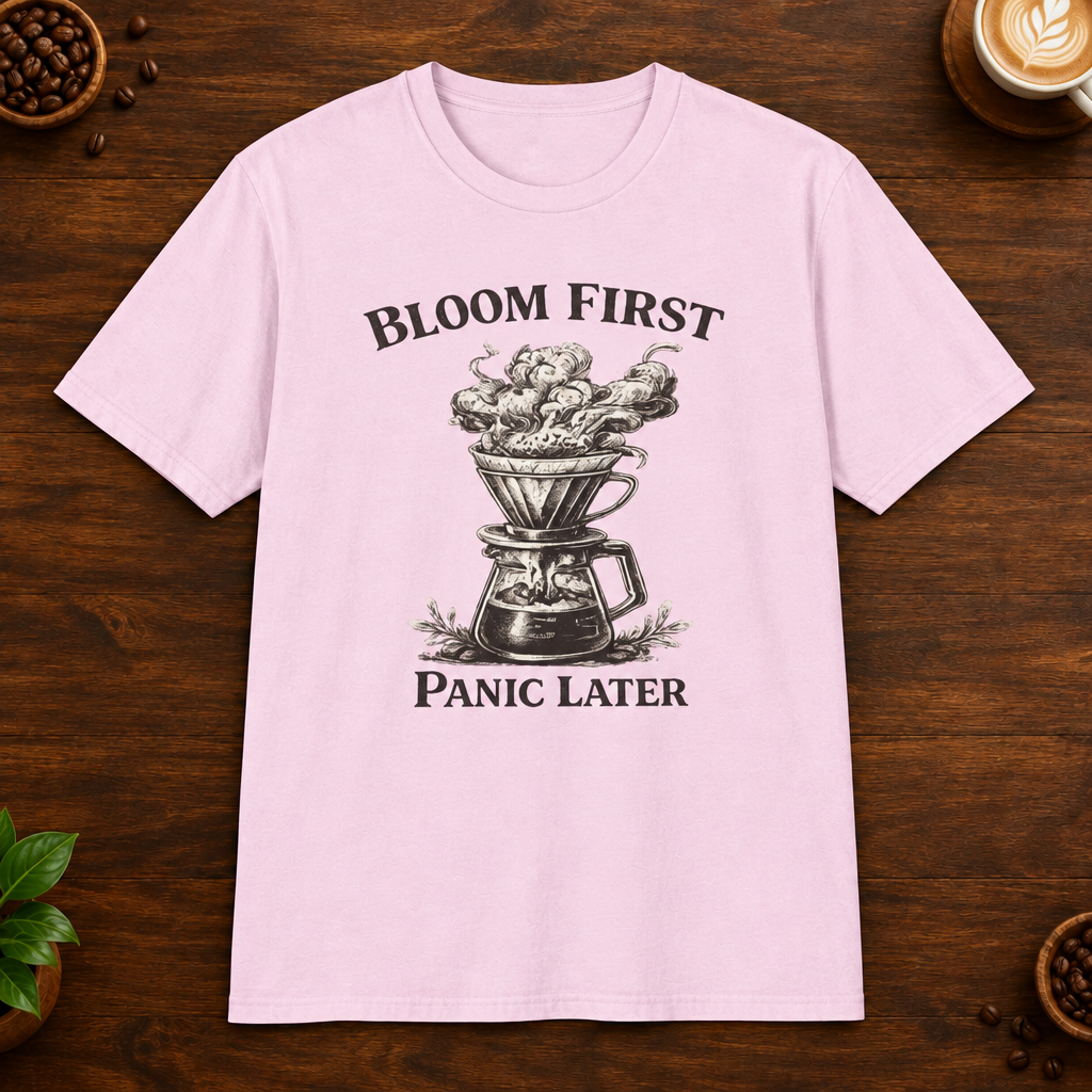 Bloom First T-Shirt in Light Pink on a wooden coffee-themed background