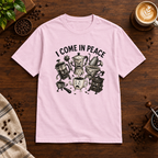 I Come in Peace T-Shirt Light Pink on warm coffee bar