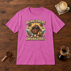Bean There Drank That T-Shirt Heather Berry flat lay on walnut coffee bar