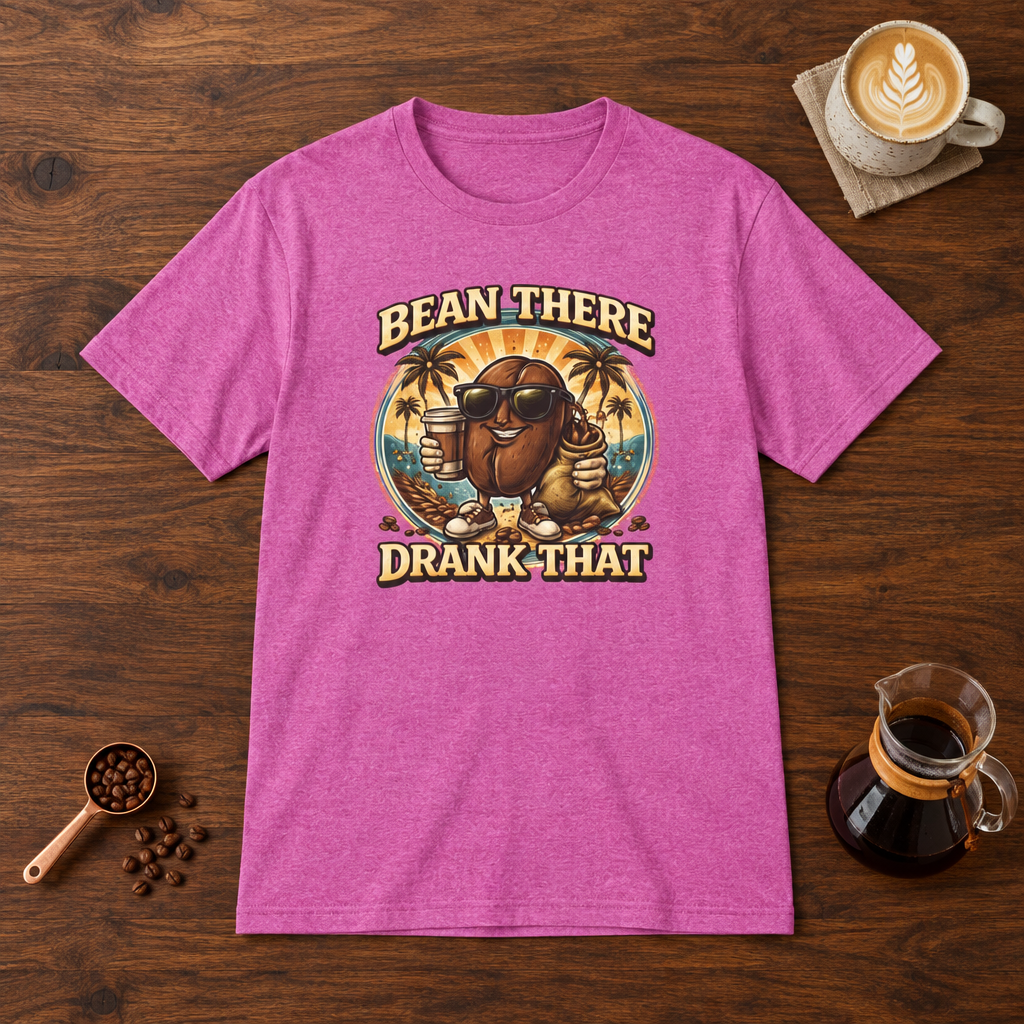 Bean There Drank That T-Shirt Heather Berry flat lay on walnut coffee bar