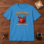 Coffee First Morality Later red cup T-Shirt Heather Sapphire flat lay on walnut coffee bar