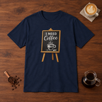I Need Coffee T-Shirt Navy flat lay on walnut coffee bar