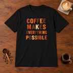 Coffee Makes Everything Possible text print T-Shirt Black flat lay on walnut coffee bar