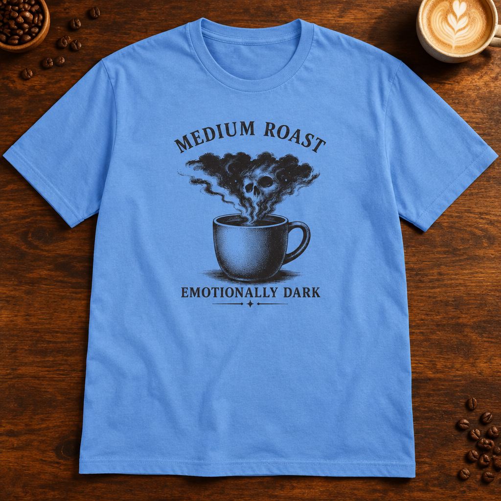 Medium Roast T-Shirt in Carolina Blue on a dark wood coffee bar