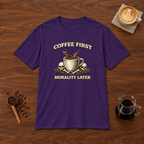 Coffee First Morality Later T-Shirt Purple flat lay on walnut coffee bar