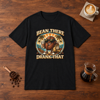 Bean There Drank That T-Shirt Black flat lay on walnut coffee bar
