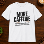 More Caffeine T-Shirt in White on a dark wood coffee bar
