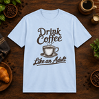 Drink Coffee Like an Adult T-Shirt in Light Blue, coffee bar flat lay mockup